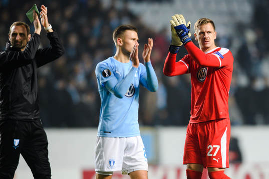 Goalkeeper Johan Dahlin of Malmö FF thanks the supporters