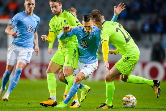 Arnór Ingvi Traustason of Malmö FF and Ole Jørgen