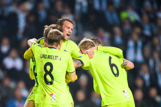 Ole Jørgen Halvorsen celebrates with Patrick Mortensen of