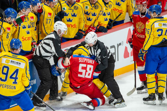 Anton Slepyshev #58, RUS and Linus Johansson #59, SWE fight