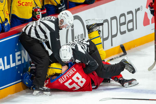 Anton Slepyshev #58, RUS and Linus Johansson #59, SWE fight