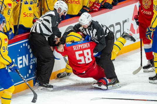 Anton Slepyshev #58, RUS and Linus Johansson #59, SWE fight