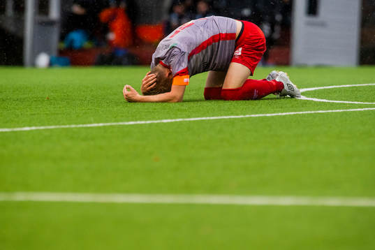 Kristian Jahr of Strømmen with an injury