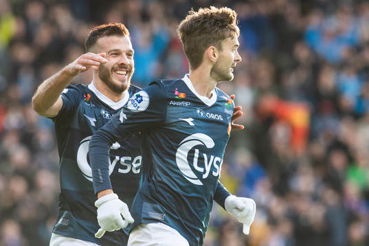 Zlatko Tripic and Johnny Furdal of Viking celebrate