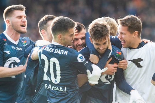 Johnny Furdal of Viking celebrates  with team mates
