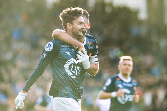 Zlatko Tripic and Johnny Furdal of Viking celebrate