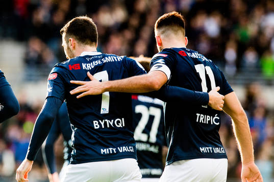 Zymer Bytyqi and Zlatko Tripic of Viking celebrate