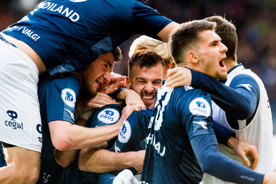 Zlatko Tripic of Viking celebrates with his teammates