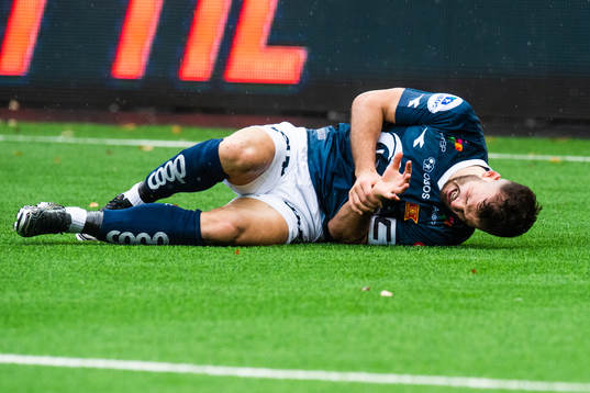 Zlatko Tripic of Viking lies down due to injury