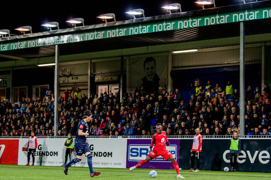 Bent Sørmo of Kristiansund and Daouda Bamba of Brann