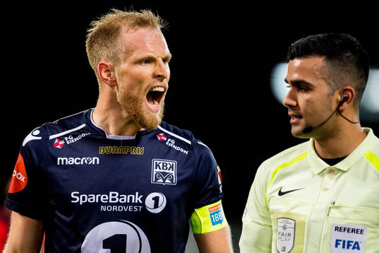Dan Peter Ulvestad of Kristiansund argues with Rohit Saggi,
