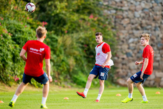 Hasan Hüseyin Duman and Jens Petter Hauge of Norway