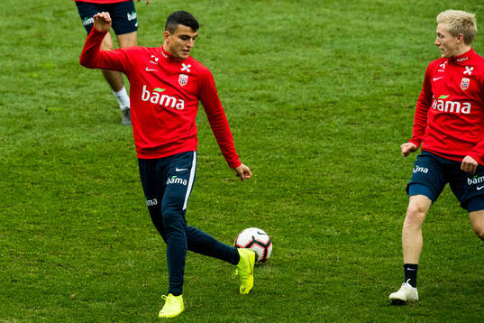 Mohamed Elyounoussi and Birger Meling of Norway