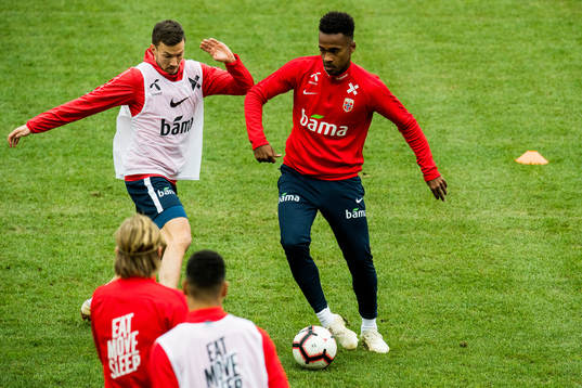 Martin Linnes and Ola Kamara of Norway