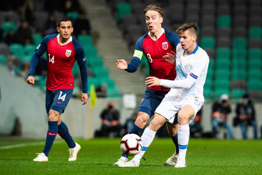 Stefan Johansen of Norway and Miha Zajc of Slovenia
