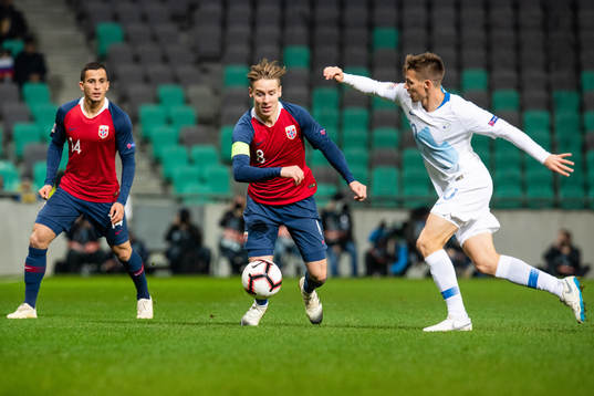Omar Elabdellaoui and Stefan Johansen of Norway  and Miha