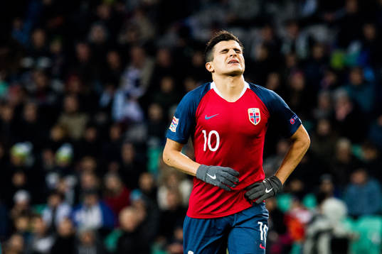 Tarik Elyounoussi of Norway looks dejected