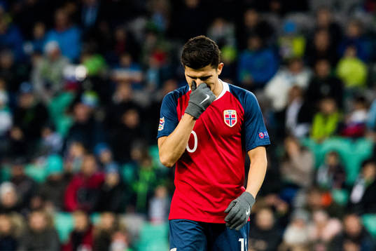 Tarik Elyounoussi of Norway looks dejected