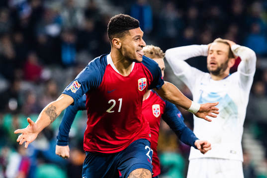 Bjørn Maars Johnsen of Norway celebrates scoring 1-1