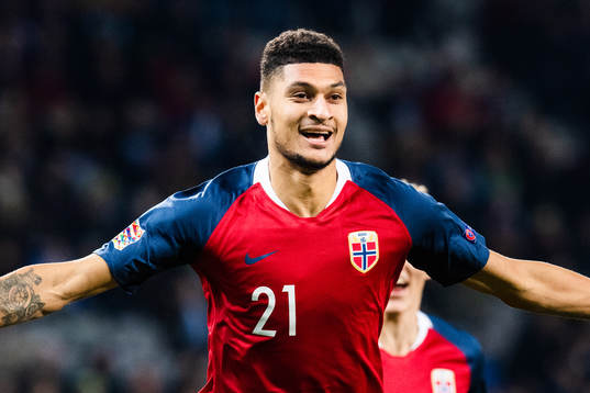 Bjørn Maars Johnsen of Norway celebrates scoring 1-1
