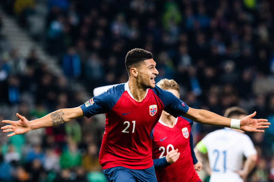 Bjørn Maars Johnsen of Norway celebrates scoring 1-1