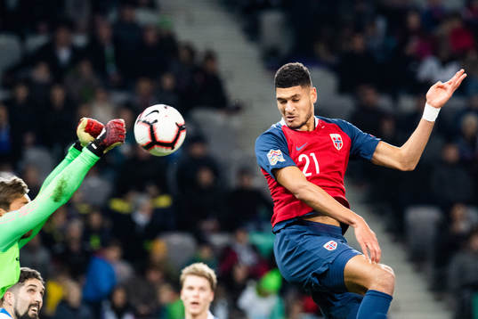 Bjørn Maars Johnsen of Norway scores 1-1
