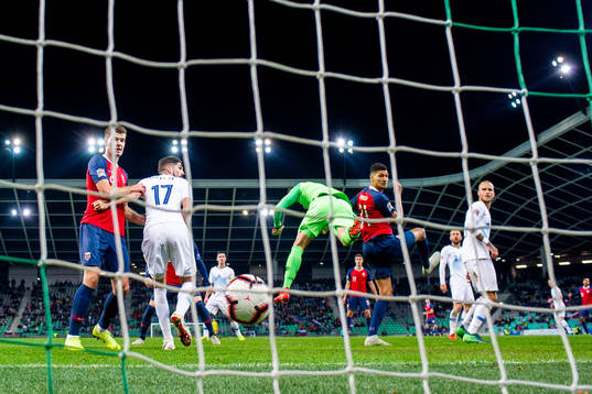 Bjørn Maars Johnsen of Norway scores the 1-1 goal behind