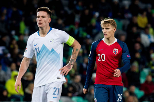 Benjamin Verbic of Slovenia and Martin Ødegaard of Norway