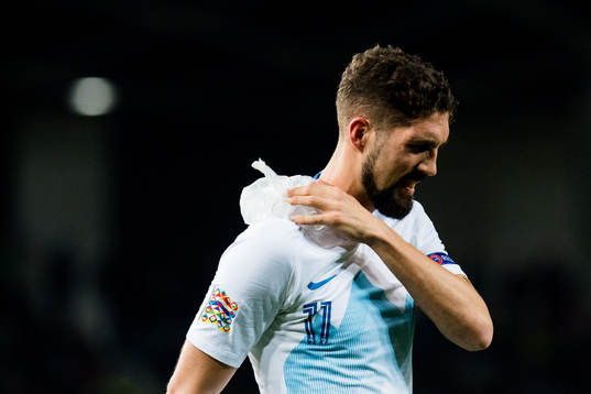 Roman Bezjak of Slovenia with an injury