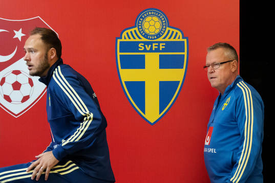 Andreas Granqvist and head coach Janne Andersson of Sweden