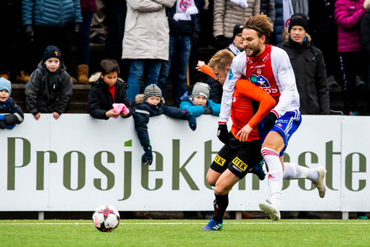 Tomas Kristoffersen of Åsane and Jørgen Hammer of KFUM