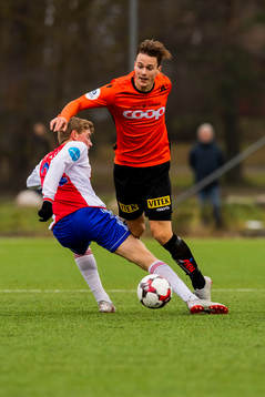 Tore André Sørås of KFUM and Martin Ueland of Åsane