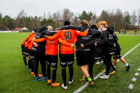 The players of Åsane ahed of the playoff match for