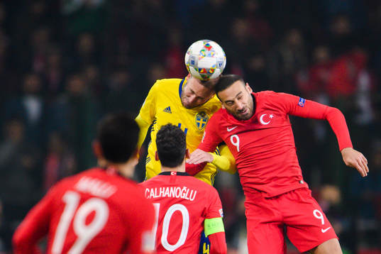 Andreas Granqvist of Sweden and Cenk Tosun of Turkey