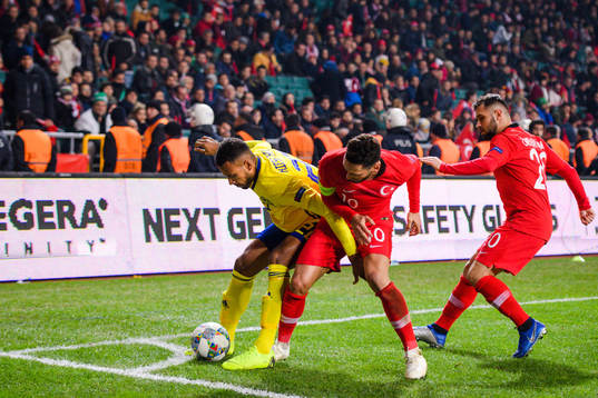 Isaac Kiese Thelin of Sweden in a duel with Hakan
