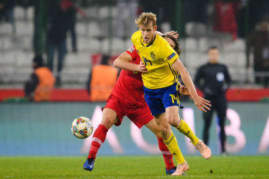 Caglar Söyuncu of Turkey and Filip Helander of Sweden