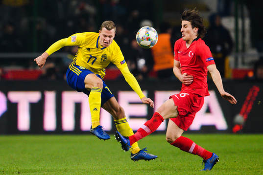 Viktor Claesson of Sweden and Caglar Söyuncu of Turkey