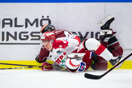 Malmö Redhawks Carl Persson och Timrås Rickard Palmberg
