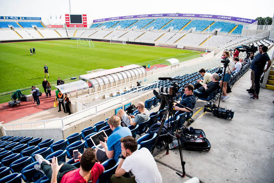 Journalists watch a training session
