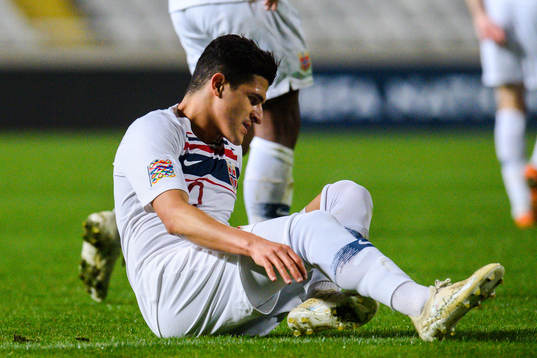 Tarik Elyounoussi of Norway looks dejected