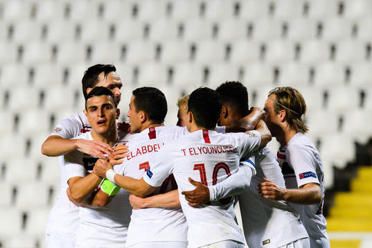 Mohamed Elyounoussi of Norway celebrates with teammates