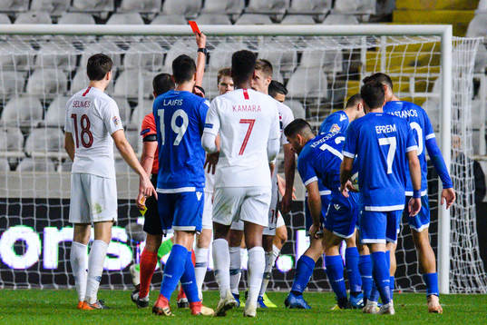 Mohamed Elyounoussi of Norway receives a red card