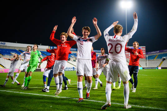 Jonas Svensson and Martin Ødegaard of Norway  celebrates