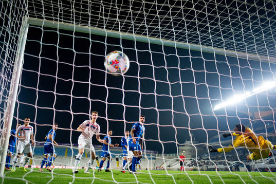 Mohamed Elyounoussi and Sigurd Rosted of Norway watch Ola