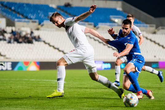 Alexander Sørloth of Norway and Kostas Laifis of Cyprus