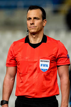 Referee István Vad of Hungary