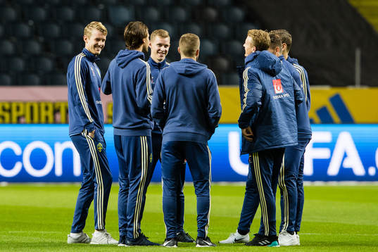 Filip Helander and Emil Krafth of Sweden with their
