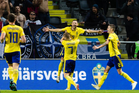 Sebastian Larsson, Marcus Berg and Mikael Lustig of Sweden