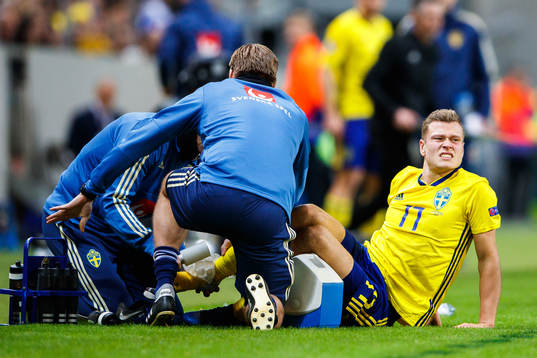 Viktor Claesson of Sweden is in pain