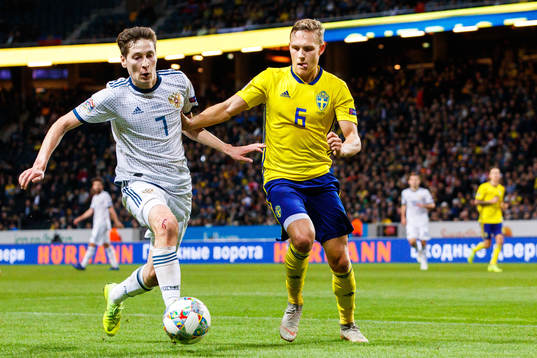 Daler Kuzyaev of Russia and Ludwig Augustinsson of Sweden